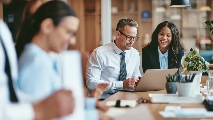 Two-smiling-businesspeople